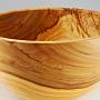 I got this wood from a firewood lot in Pasadena, CA. It's Camphor, and man, did I have clear sinuses after turning this stuff. My shop smelled like a liniment factory for a week afterward, but I liked it. <br /><br />This bowl sold before I had a chance to get measurements, but it was about 12" across and 7" high.